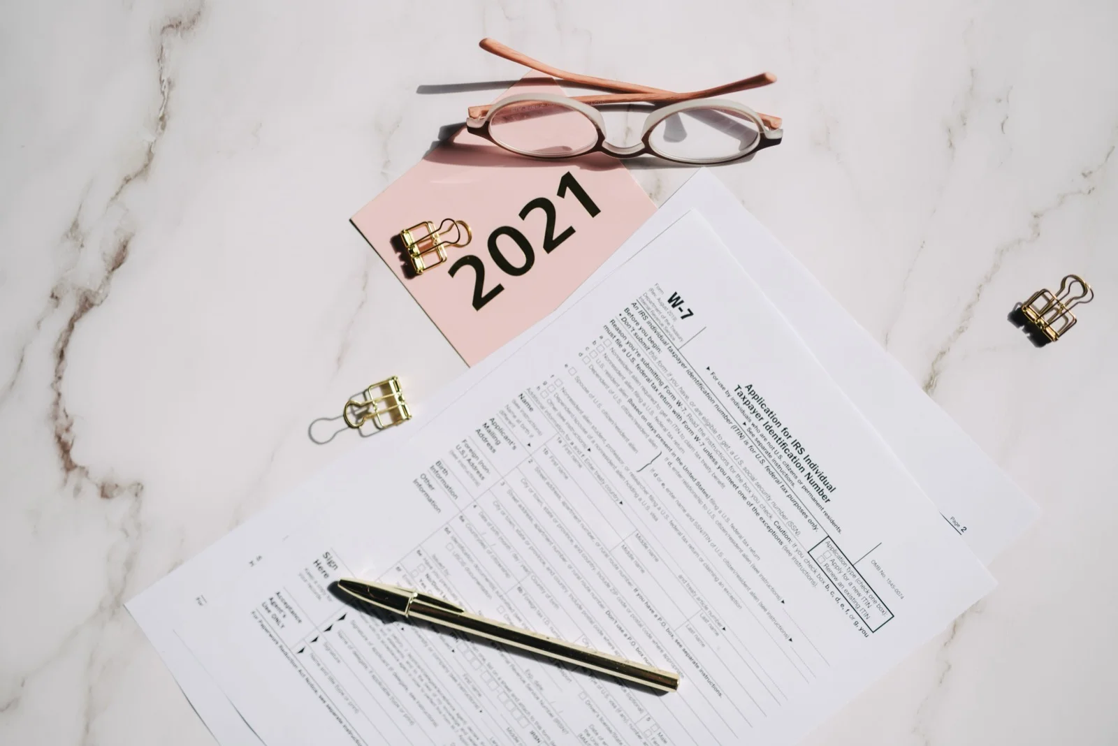 Financial tax documents, GST returns, and accounting figures on desk