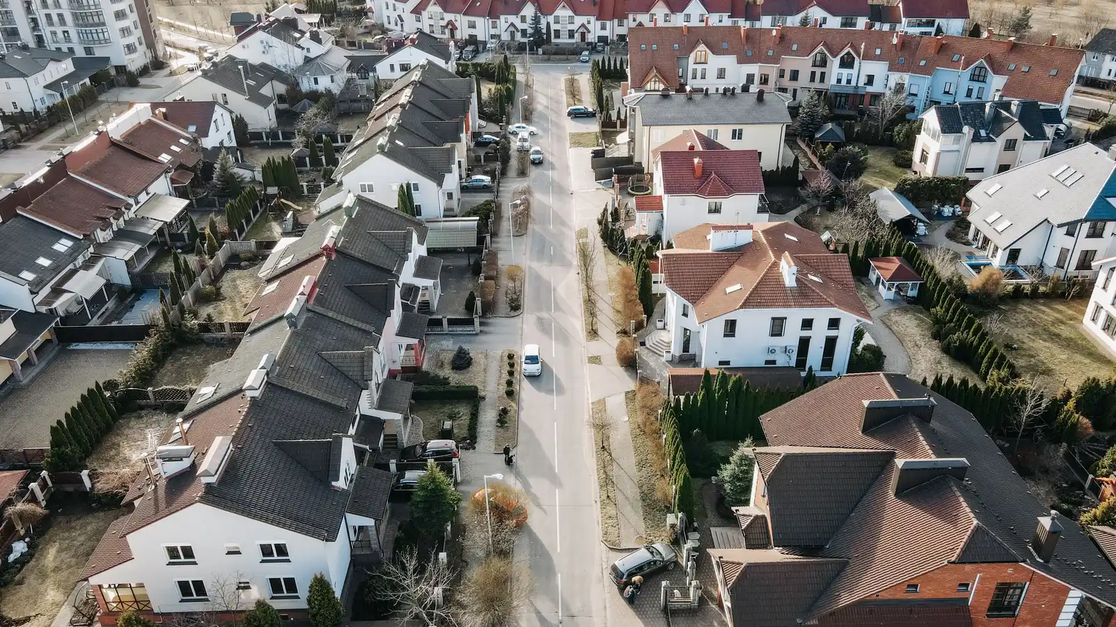 Aerial view of a suburban housing neighbourhood with rows of homes